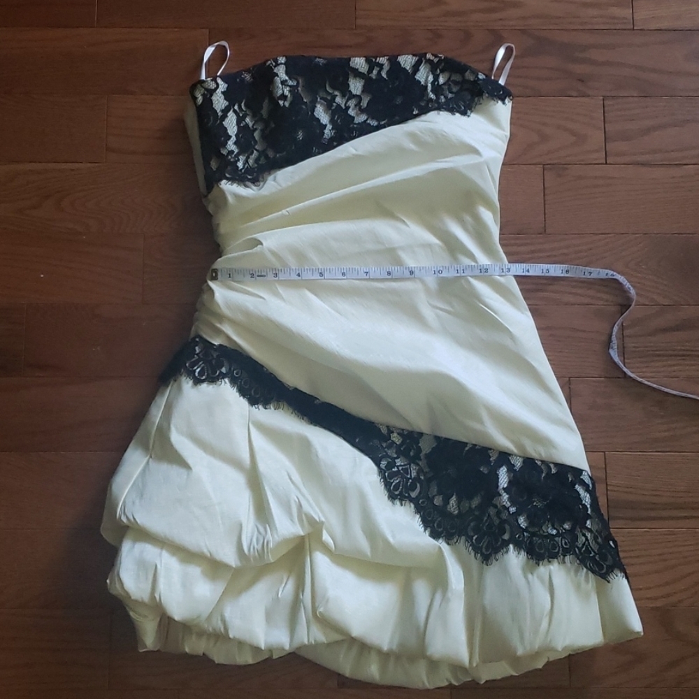Elegant Ivory Mini Dress with Black Lace Trim